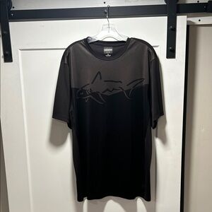 Greg Norman Collection Black Two-Tone Performance Tee with Shark Graphic